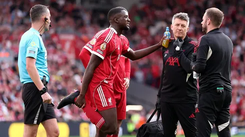 LIVERPOOL, ENGLAND - AUGUST 31: Ibrahima Konate of Liverpool reacts with an injury before being substituted off during the Premier League match between Liverpool and Arsenal at Anfield on August 31, 2025 in Liverpool, England. (Photo by Alex Pantling/Getty Images)