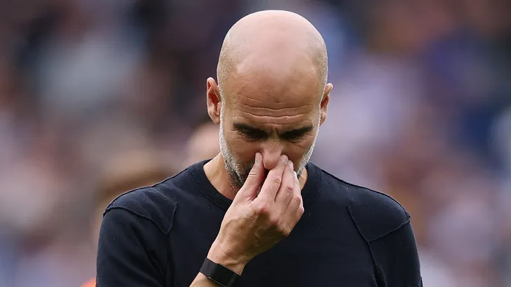 BRIGHTON, ENGLAND - AUGUST 31: Pep Guardiola, Manager of Manchester City, reacts following the team's defeat during the Premier League match between Brighton & Hove Albion and Manchester City at Amex Stadium on August 31, 2025 in Brighton, England. (Photo by Justin Setterfield/Getty Images)
