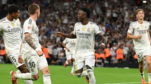 MADRID, SPAIN - OCTOBER 04: Vinicius Junior of Real Madrid celebrates with team mates Jude Bellingham and Franco Mastantuono after scoring his team's second goal during the LaLiga EA Sports match between Real Madrid CF and Villarreal CF at Estadio Santiago Bernabeu on October 04, 2025 in Madrid, Spain. (Photo by Denis Doyle/Getty Images)