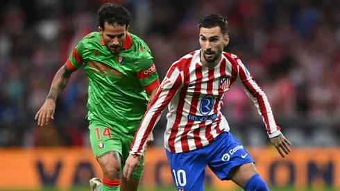 MADRID, SPAIN – OCTOBER 18: Alex Baena of Atletico de Madrid on the ball whilst under pressure by Ruben Garcia of CA Osasuna during the LaLiga EA Sports match between Atletico de Madrid and CA Osasuna at Riyadh Air Metropolitano on October 18, 2025 in Madrid, Spain. (Photo by Denis Doyle/Getty Images)