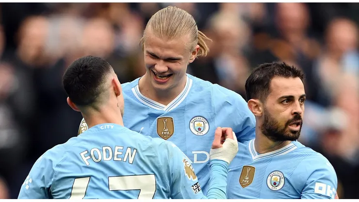 Erling Haaland do Manchester City com Phil Foden e Bernardo Silva (Foto: Michael Regan/Getty Images)