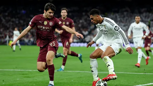 Jude Bellingham do Real Madrid e Abdukodir Khusanov do Manchester City, em campo. Times se enfrentam nesta quarta (10). (Foto: Clive Brunskill/Getty Images)