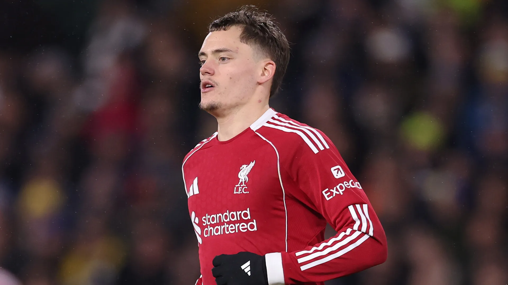 Florian Wirtz corre durante partida do Liverpool. Jogador é alvo do Real Madrid. Alex Livesey/Getty Images