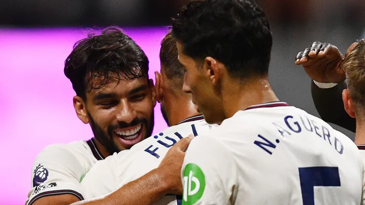 Paquetá e Fullkrug se abraçam. (Photo by AJ Reynolds/Getty Images)