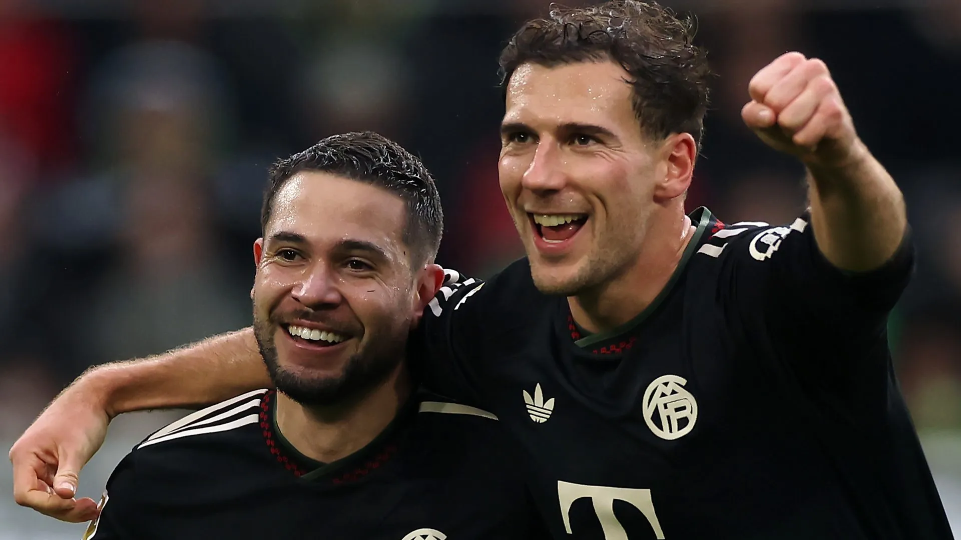 Goretzka e Raphel Guerreiro. (Photo by Dean Mouhtaropoulos/Getty Images)