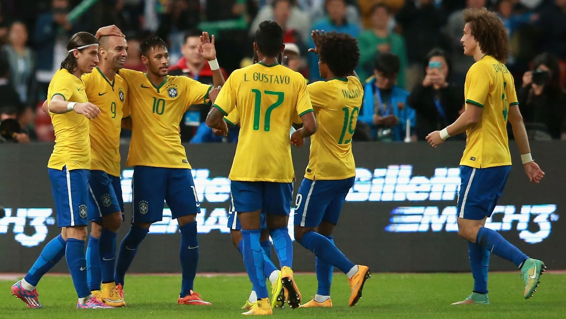 Seleção Brasileira comemora após marcar gol em 2014. Foto: Feng Li/Getty Images