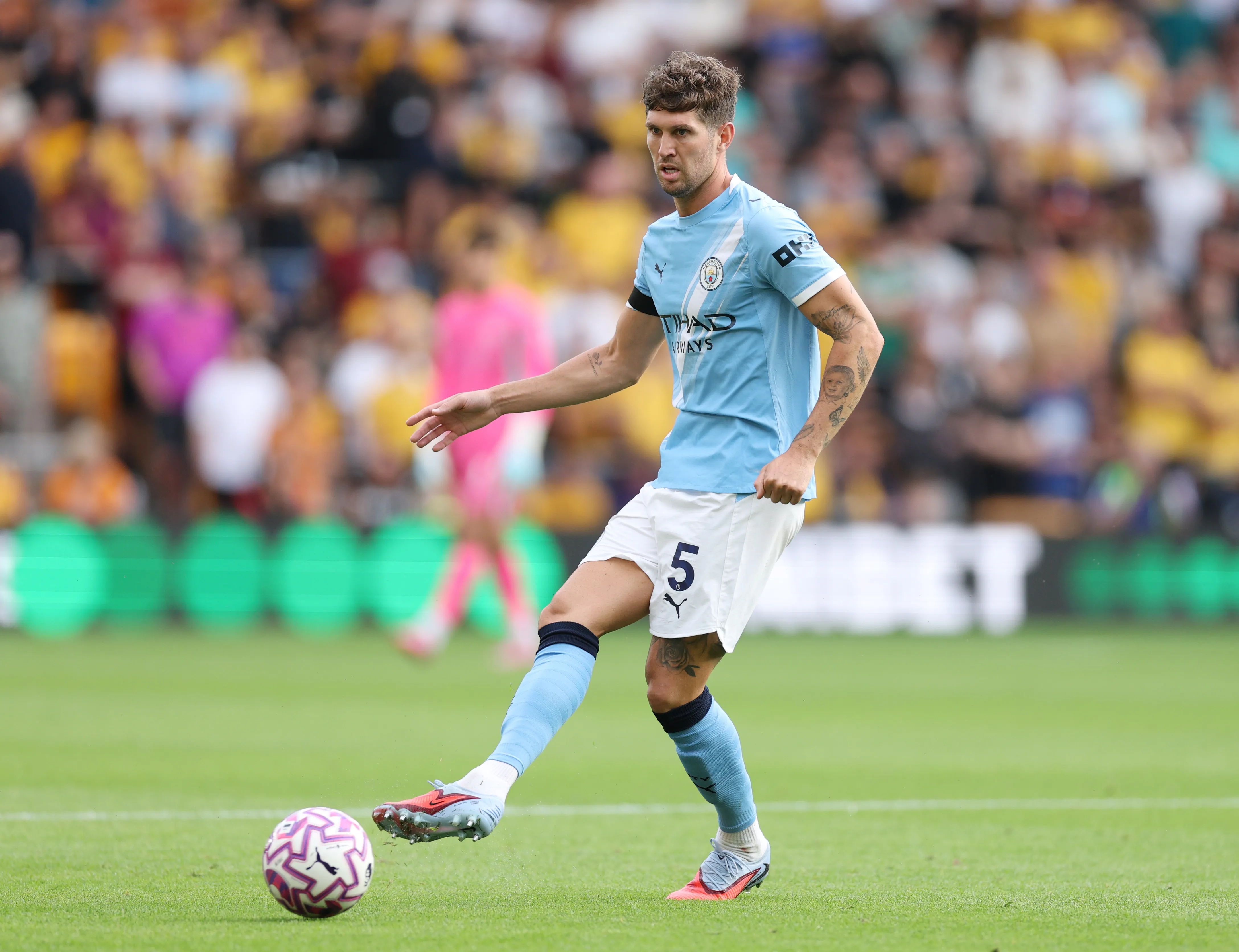 Stones em jogo do Manchester City. Foto: Michael Regan/Getty Images