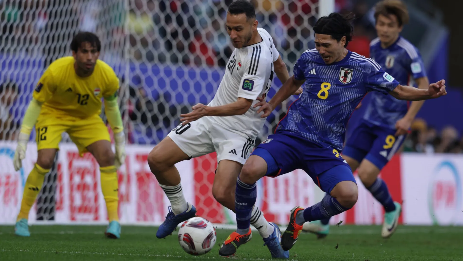 Osama Rashid, do Iraque, durante partida da Copa da Ásia. Foto: IMAGO/ Sebastião Frej
