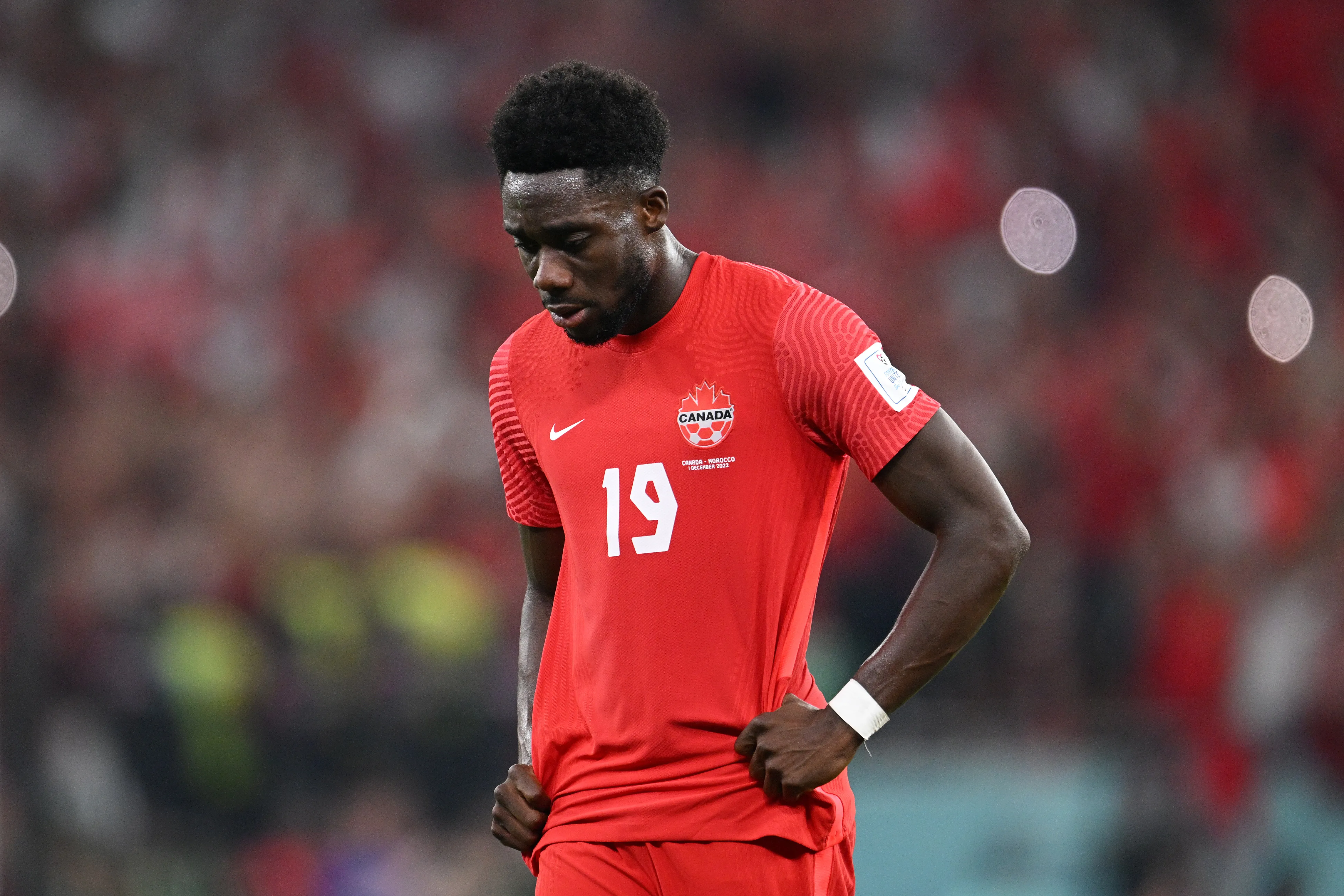 Alphonse Davies durante partida da Seleção Canadense na Copa de 2022. (Photo by Matthias Hangst/Getty Images)
