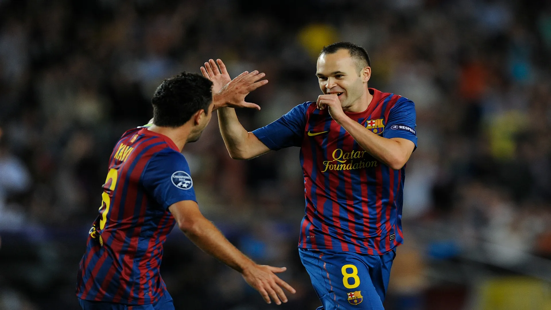 Xavi e Iniesta no Barcelona, em 2011 – David Ramos/Getty Images