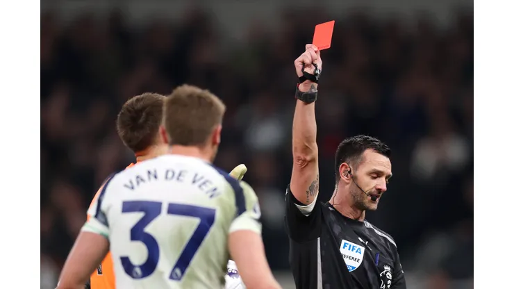 LONDON, ENGLAND - MARCH 05: Referee Andrew Madley shows a red card to Micky van de Ven of Tottenham Hotspur during the Premier League match between Tottenham Hotspur and Crystal Palace at Tottenham Hotspur Stadium on March 05, 2026 in London, England. (Photo by Julian Finney/Getty Images)