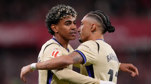 Raphinha e Lamine Yamal, do Barcelona. (Foto: Juan Manuel Serrano Arce/Getty Images)