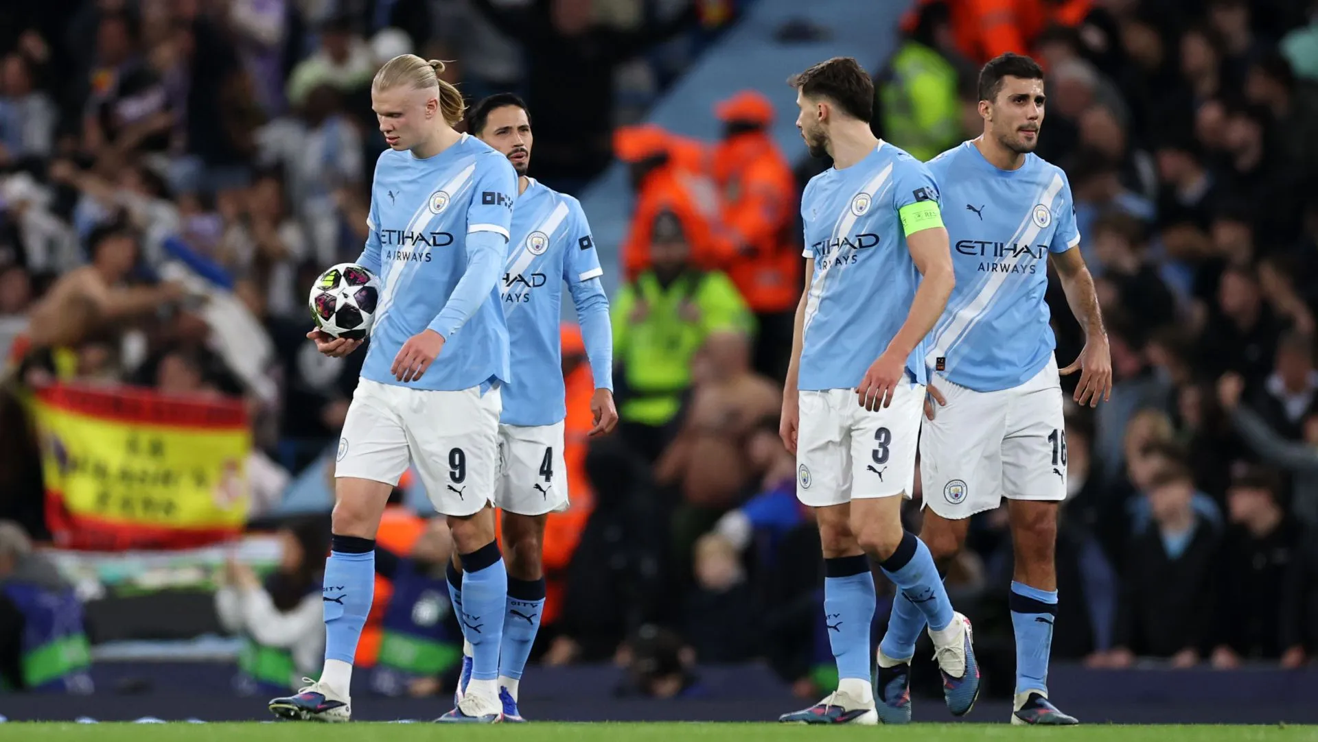 Jogadores do Manchester City durante partida da Champions League. Foto: Michael Regan/Getty Images