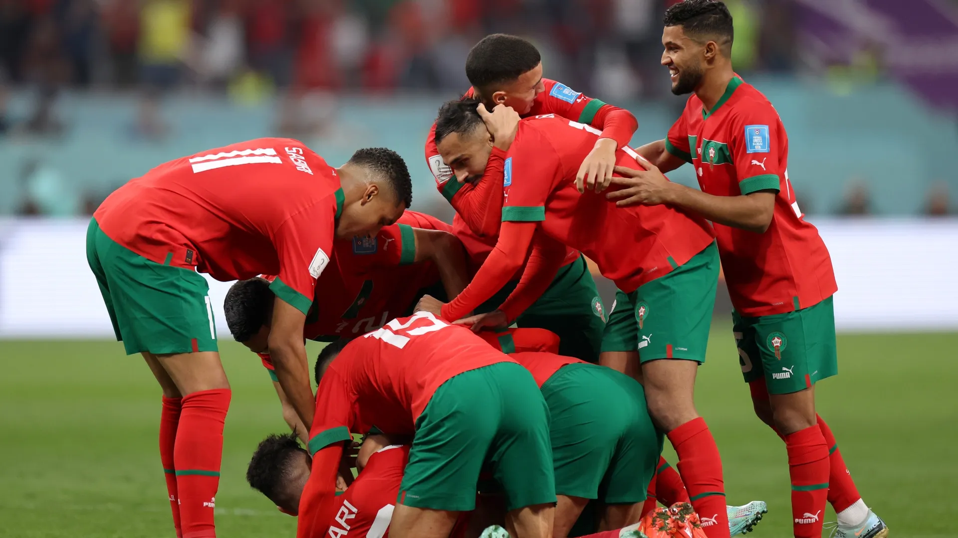 Jogadores de Marrocos comemoram gol