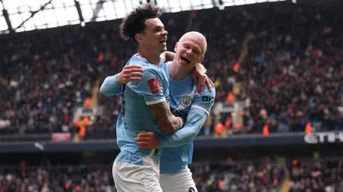 O'Reilly e Haaland em campo pelo Manchester City. Foto: Carl Recine/Getty Images