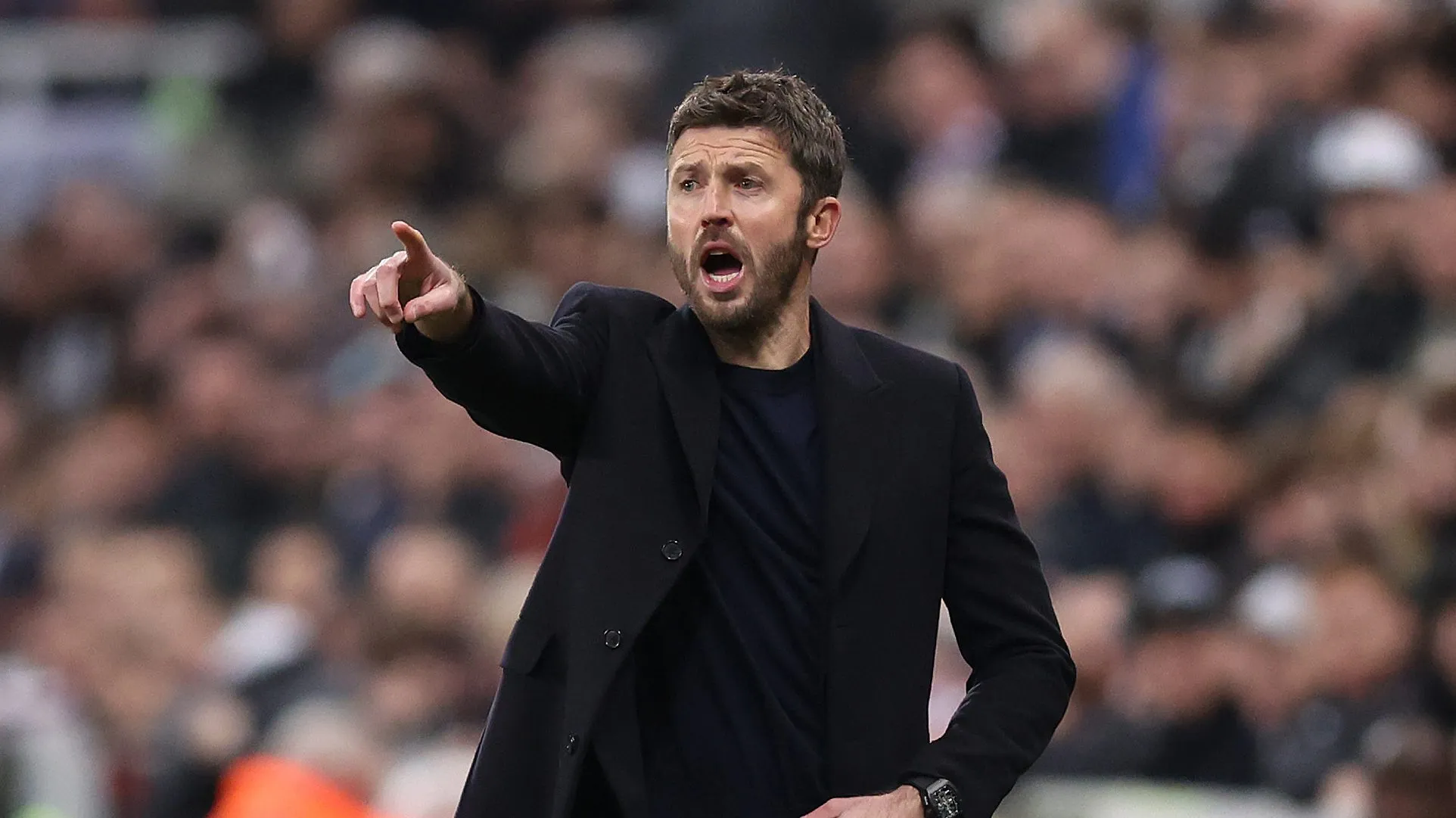 Michael Carrick à beira do campo pelo United
