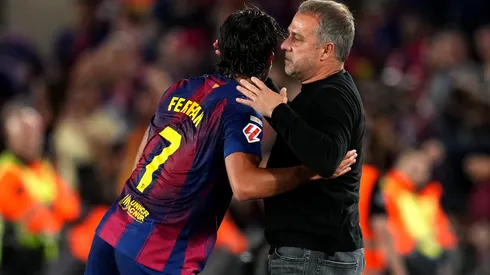 Ferran Torres comemora com Hansi-Flick. (Photo by Alex Caparros/Getty Images)