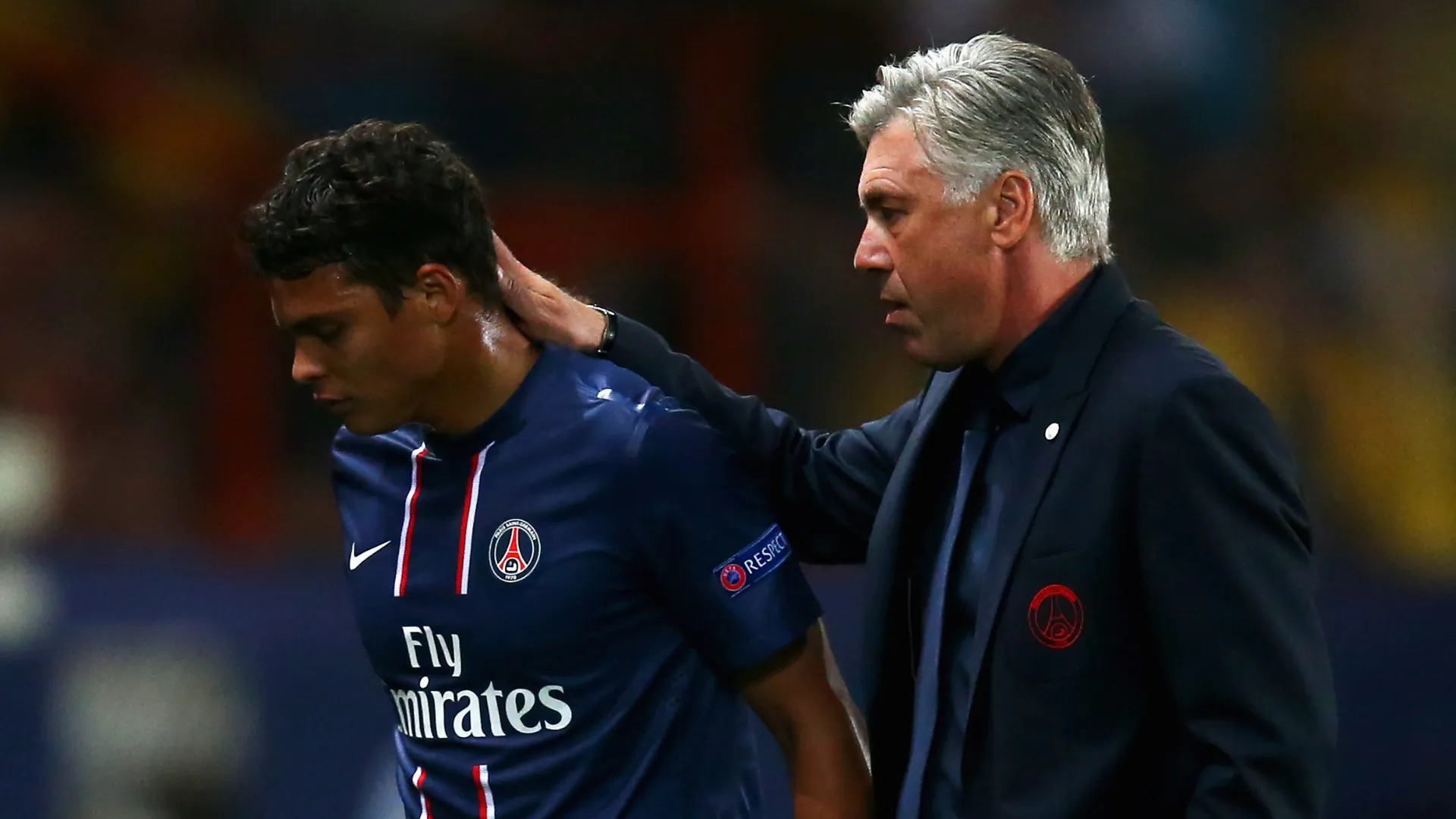 Carlo Ancelotti ao lado de Thiago Silva
