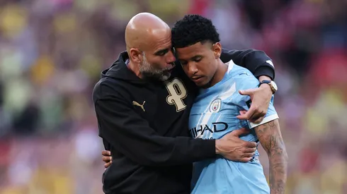 Savinho e Guardiola no Manchester City (Justin Setterfield/Getty Images)