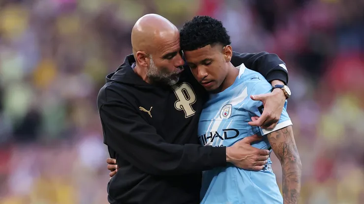 Savinho e Guardiola no Manchester City (Justin Setterfield/Getty Images)