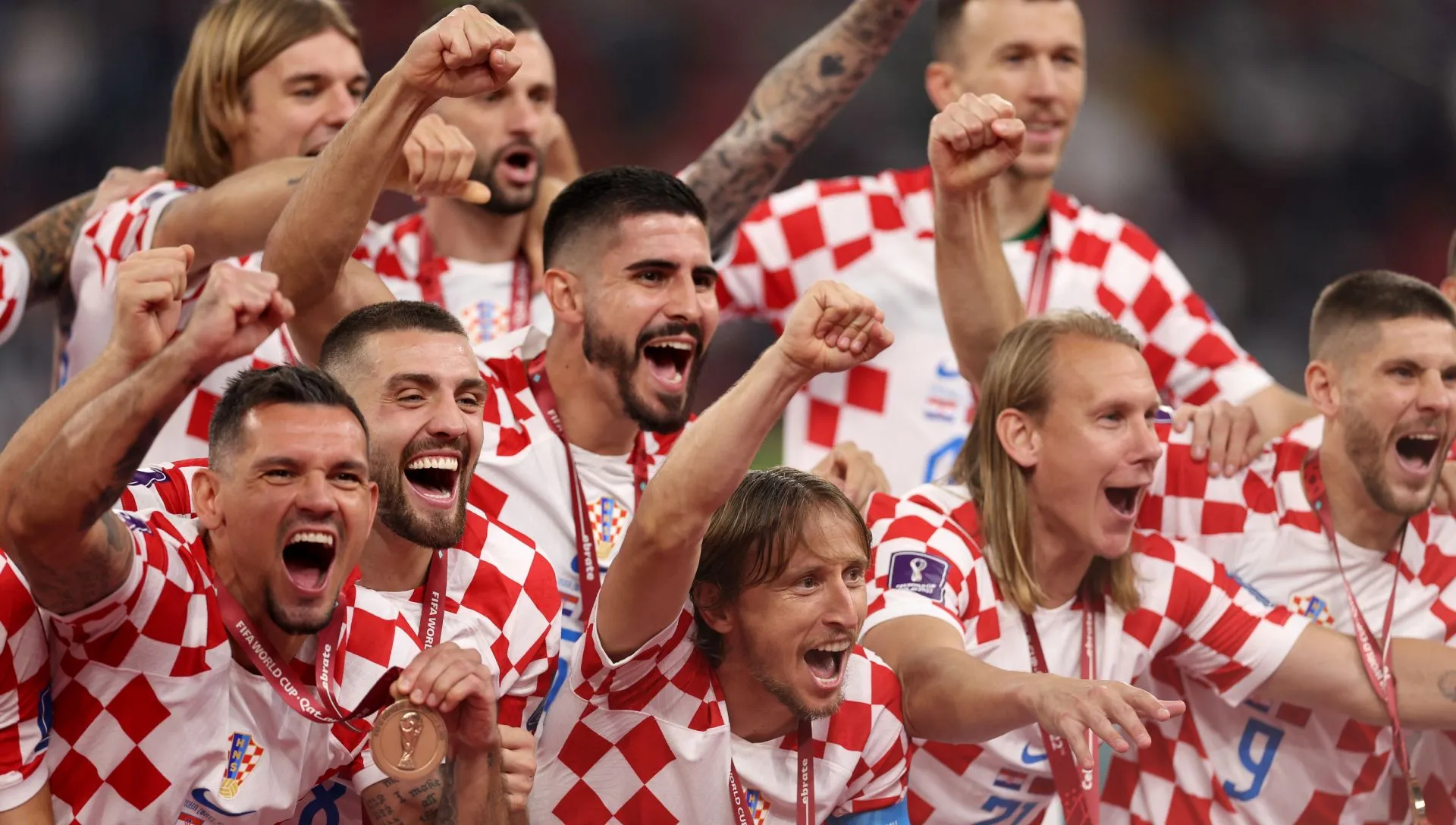 Jogadores da Croácia comemoram terceiro lugar na Copa de 2022. Foto: Richard Heathcote/Getty Images