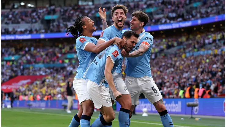 Jogadores do Manchester City durante partida da temporada. Foto: Justin Setterfield/Getty Images