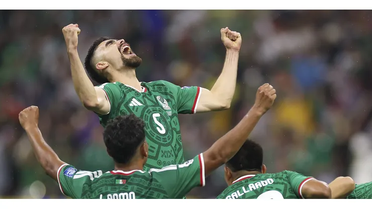 Jogadores do México comemorando a classificação na Copa (Photo by Carl Recine/Getty Images)