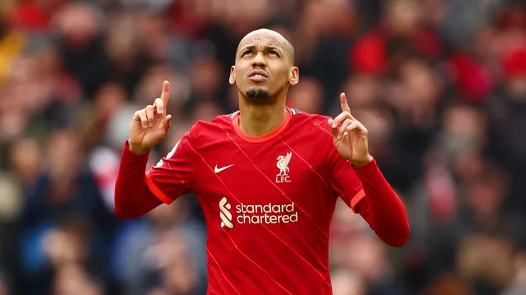 Fabinho of Liverpool celebrates after scoring their team's second goal from the penalty spo during the Premier League match between Liverpool and Watford at Anfield on April 02, 2022 in Liverpool, England.