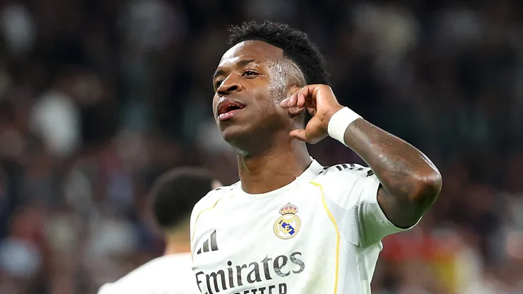 Vinicius Junior of Real Madrid celebrates scoring his team's third goal during the LaLiga EA Sports match between Real Madrid CF and Atletico de Madrid at Estadio Santiago Bernabeu on March 22, 2026 in Madrid, Spain.