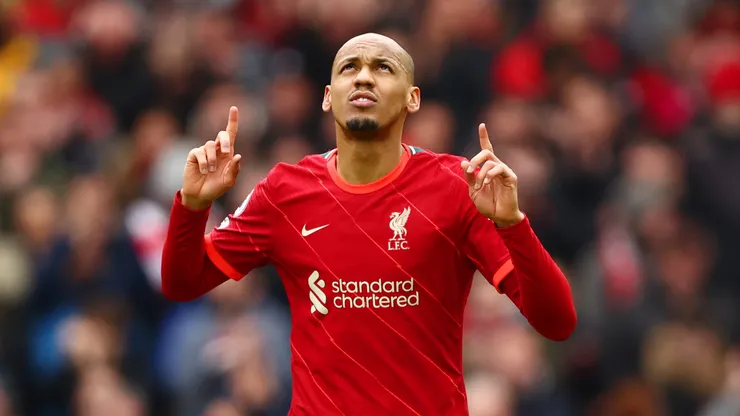 Fabinho of Liverpool celebrates after scoring their team's second goal from the penalty spo during the Premier League match between Liverpool and Watford at Anfield on April 02, 2022 in Liverpool, England.