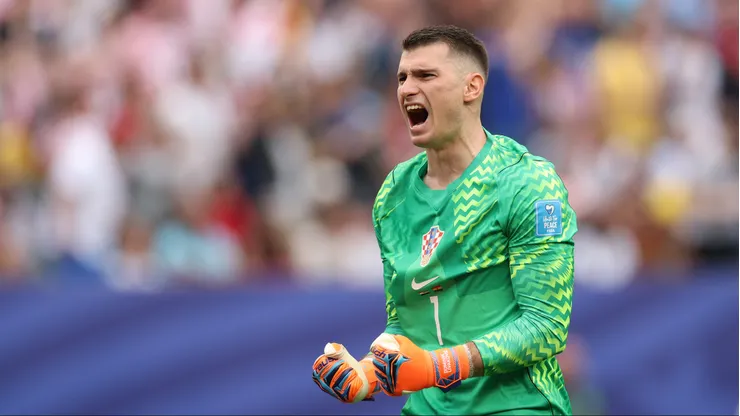 PHILADELPHIA, PENNSYLVANIA - JUNE 27: Dominik Livakovic #1 of Croatia celebrates the team's first goal scored by Petar Sucic #17 (not pictured) during the FIFA World Cup 2026 Group L match between Croatia and Ghana at Philadelphia Stadium on June 27, 2026 in Philadelphia, Pennsylvania. (Photo by Darrian Traynor/Getty Images)