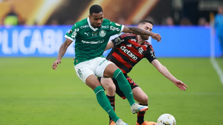 Allan of Palmeiras is challenged by Jorginho of Flamengo during the 2025 Copa CONMEBOL Libertadores Final match between Palmeiras and Flamengo at Estadio Monumental on November 29, 2025 in Lima, Peru.