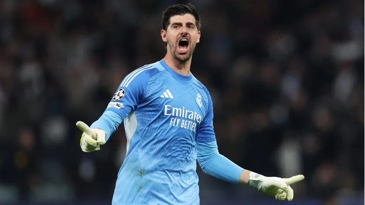Thibaut Courtois of Real Madrid celebrates after their sides second goal by Federico Valverde (not pictured) during the UEFA Champions League 2025/26 Round of 16 First Leg match between Real Madrid CF and Manchester City FC at Estadio Santiago Bernabeu on March 11, 2026 in Madrid, Spain.
