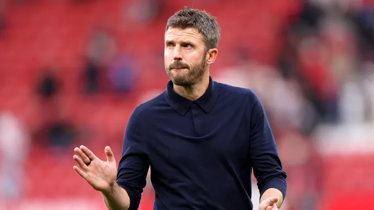 MANCHESTER, ENGLAND - SEPTEMBER 13: Michael Carrick, Manager of Manchester United, applauds the fans after the Premier League 2026/27 match between Manchester United and Manchester City at Old Trafford on September 13, 2026 in Manchester, England. (Photo by Carl Recine/Getty Images)