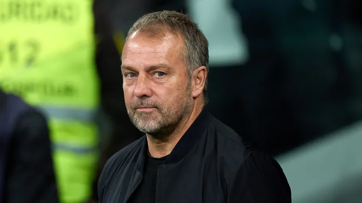 MADRID, SPAIN - OCTOBER 26: Hansi Flick, Head Coach of FC Barcelona, looks on prior to the LaLiga match between Real Madrid CF and FC Barcelona at Estadio Santiago Bernabeu on October 26, 2024 in Madrid, Spain. (Photo by Angel Martinez/Getty Images)