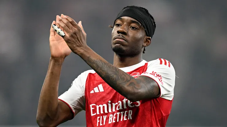 Noni Madueke of Arsenal applauds the fans after the draw during the UEFA Champions League 2025/26 Round of 16 First Leg match between Bayer 04 Leverkusen and Arsenal FC at BayArena on March 11, 2026 in Leverkusen, Germany.