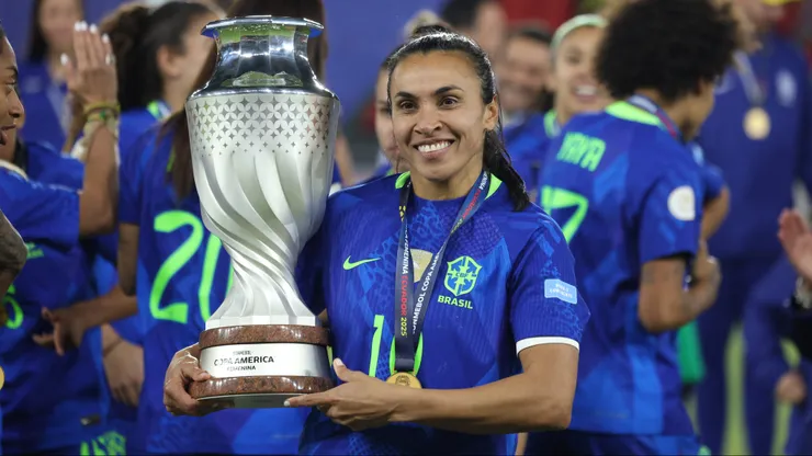 QUITO, ECUADOR - AUGUST 2: Marta Vieira of Brazil poses with the trophy after the CONMEBOL Copa America Femenina 2025 Final match between Colombia and Brazil at Rodrigo Paz Delgado Stadium on August 2, 2025 in Quito, Ecuador. (Photo by Franklin Jacome/Getty Images)