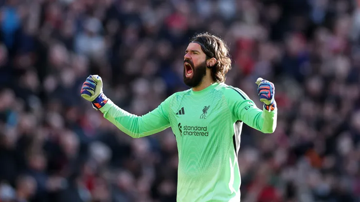 Alisson Becker of Liverpool celebrates after teammate Alexis Mac Allister (not pictured) scored the team's third goal during the Premier League match between Liverpool and West Ham United at Anfield on February 28, 2026 in Liverpool, England.