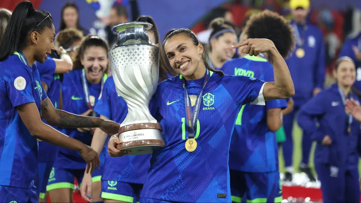 QUITO, ECUADOR - AUGUST 2: Marta Vieira of Brazil poses with the trophy after the CONMEBOL Copa America Femenina 2025 Final match between Colombia and Brazil at Rodrigo Paz Delgado Stadium on August 2, 2025 in Quito, Ecuador. (Photo by Franklin Jacome/Getty Images)