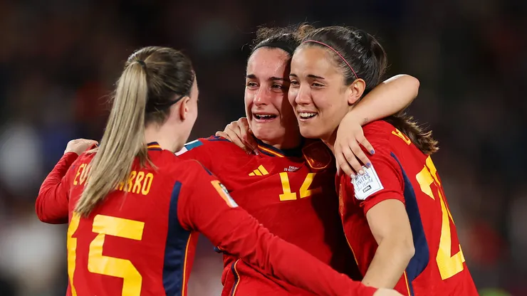 SYDNEY, AUSTRALIA - AUGUST 20: Eva Navarro, Oihane Hernandez and Rocio Galvez of Spain celebrate the team’s victory following the FIFA Women's World Cup Australia & New Zealand 2023 Final match between Spain and England at Stadium Australia on August 20, 2023 in Sydney / Gadigal, Australia. (Photo by Cameron Spencer/Getty Images)