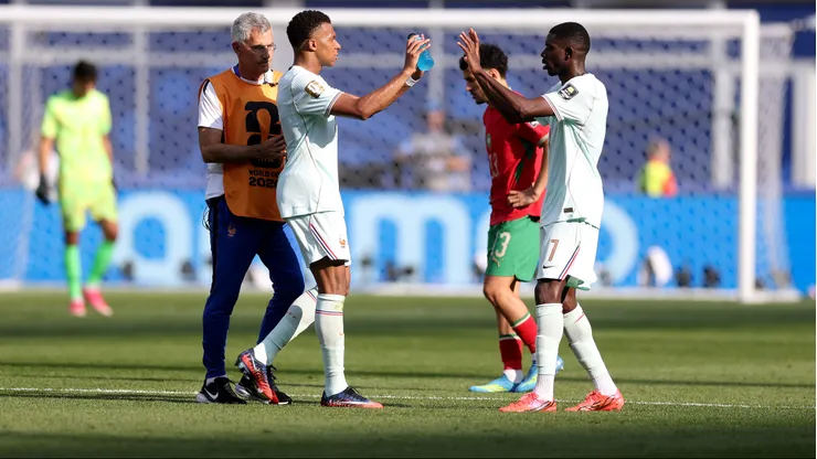 FOXBOROUGH, MASSACHUSETTS - JULY 09: Kylian Mbappe #10 of France high fives with Ousmane Dembele #7 as he is substituted during the FIFA World Cup 2026 Quarter Final match between France and Morocco at Boston Stadium on July 09, 2026 in Foxborough, Massachusetts. (Photo by Lars Baron/Getty Images)