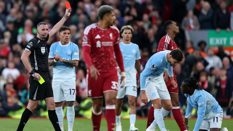 LIVERPOOL, ENGLAND - OCTOBER 11: Ryan Gravenberch of Liverpool receives a red card from referee Chris Kavanagh after getting a second yellow card during the Premier League 2026/27 match between Liverpool FC and Manchester City at Anfield on October 11, 2026 in Liverpool, England. (Photo by Michael Regan/Getty Images)