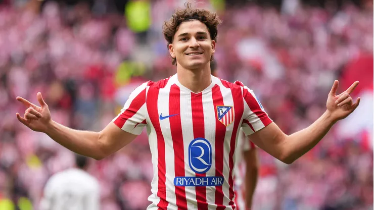 Julian Alvarez of Atletico de Madrid celebrates scoring his team's third goal during the LaLiga EA Sports match between Atletico de Madrid and Real Madrid CF at Riyadh Air Metropolitano on September 27, 2025 in Madrid, Spain.