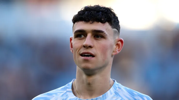 Phil Foden of Manchester City looks on during the warm up prior to the Emirates FA Cup Third Round match between Manchester City and Exeter City at Etihad Stadium on January 10, 2026 in Manchester, England.